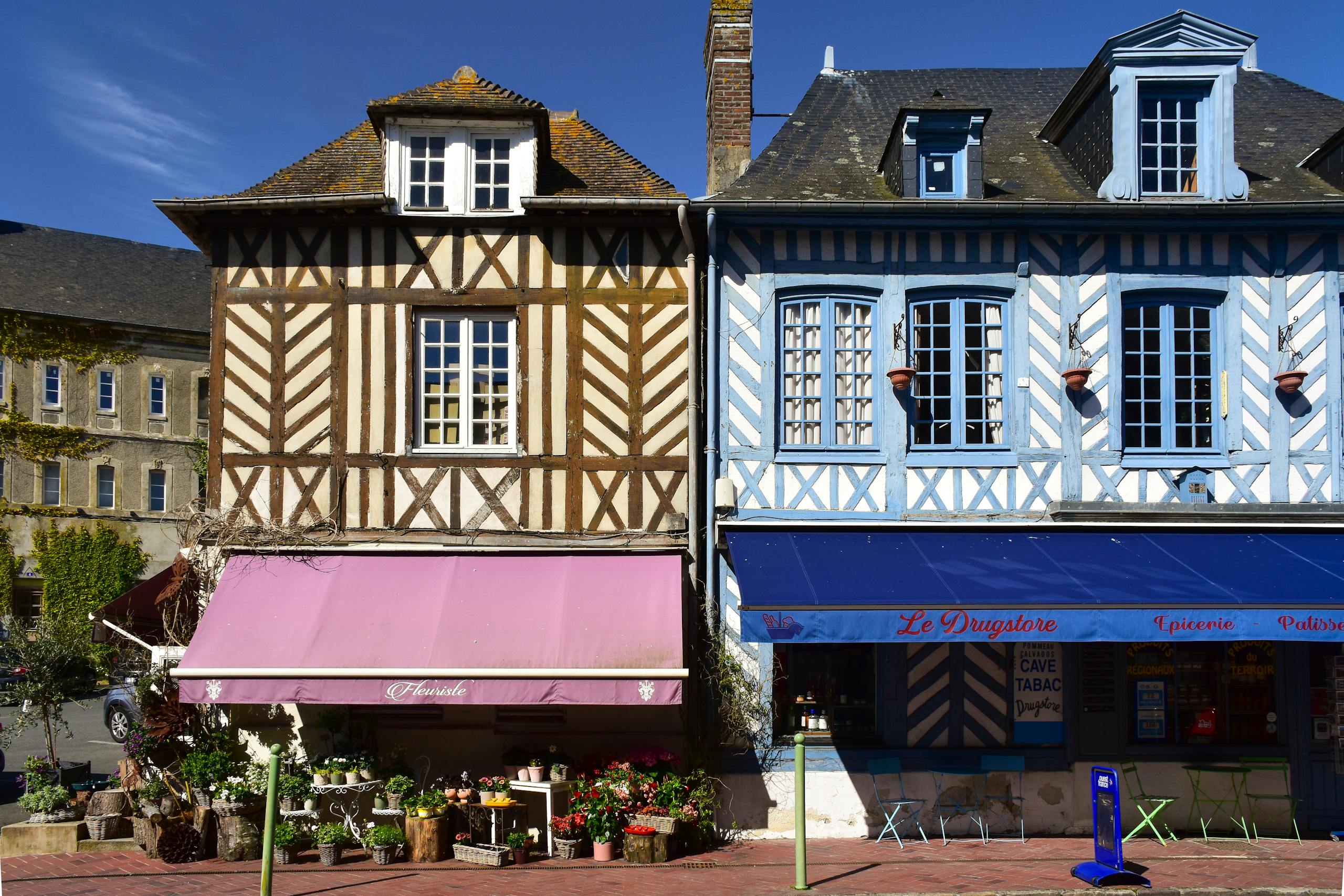 Timber-framed buildings with colorful facades in Normandy, perfect travel destination.